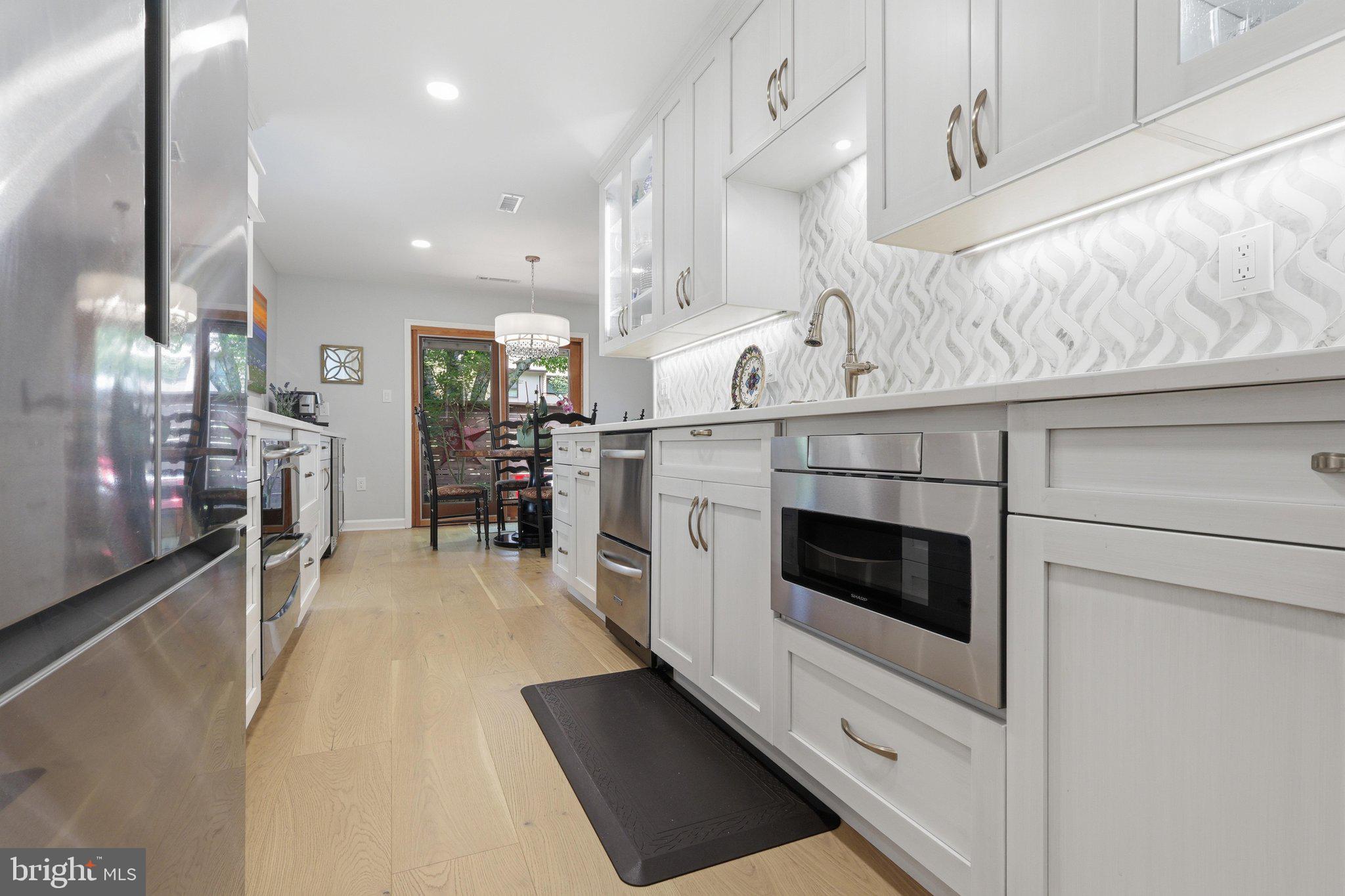 11615 Hunters Green Court Reston, VA 20191 - Photo 10 of 66 **NEW** Kitchen w/ built-in microwave & double DW