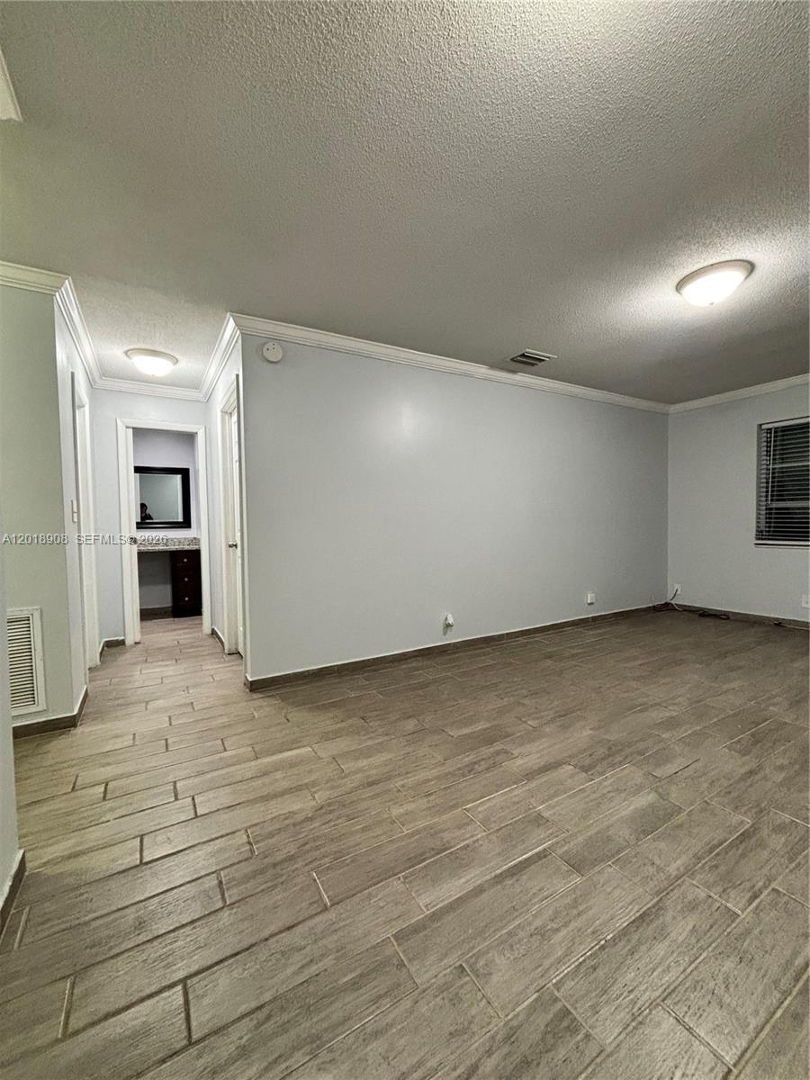 1480 East Sample Road, Unit 209 Pompano Beach, FL 33064 - Photo 10 of 24 a view of an empty room