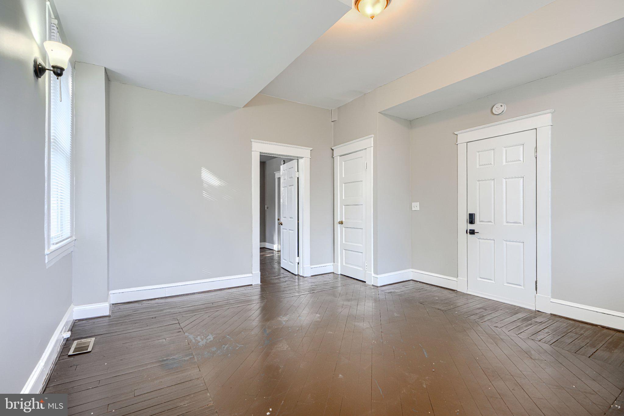 3414 Alto Road, Unit 1 Baltimore, MD 21216 - Photo 6 of 18 Spacious room with natural light.