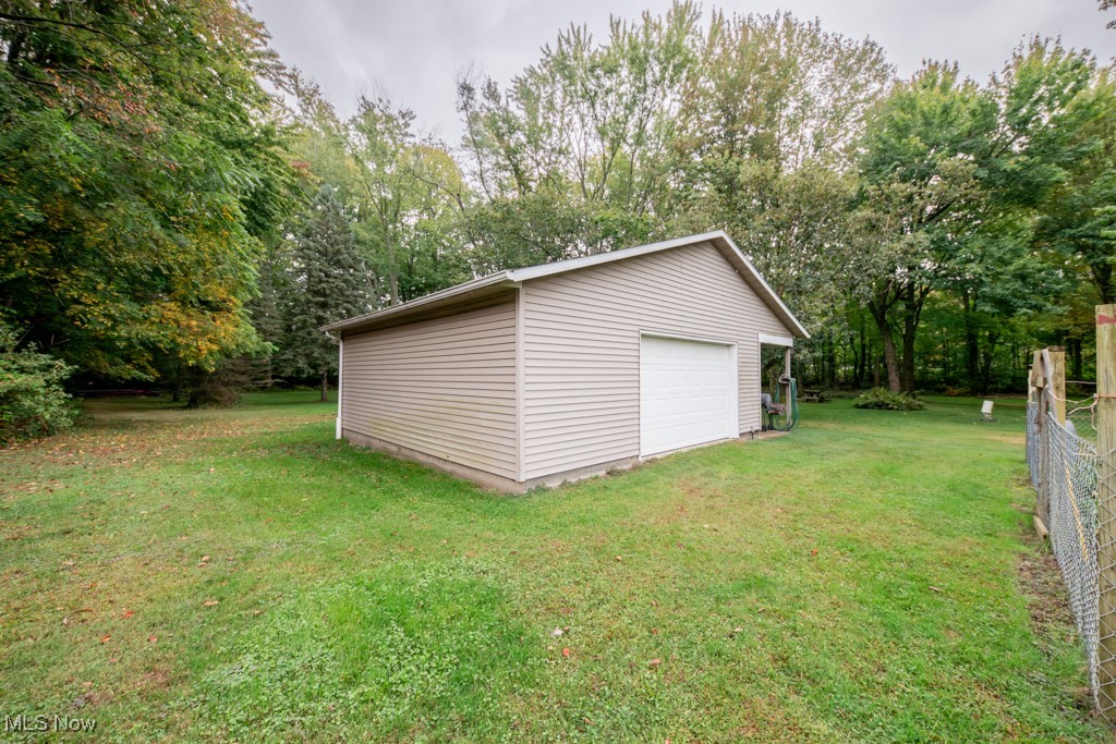 6652 Conley Road Ashtabula, OH 44004 - Photo 47 of 49 Garage with a lawn