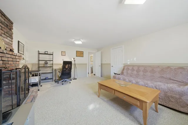 a living room with furniture and a couch