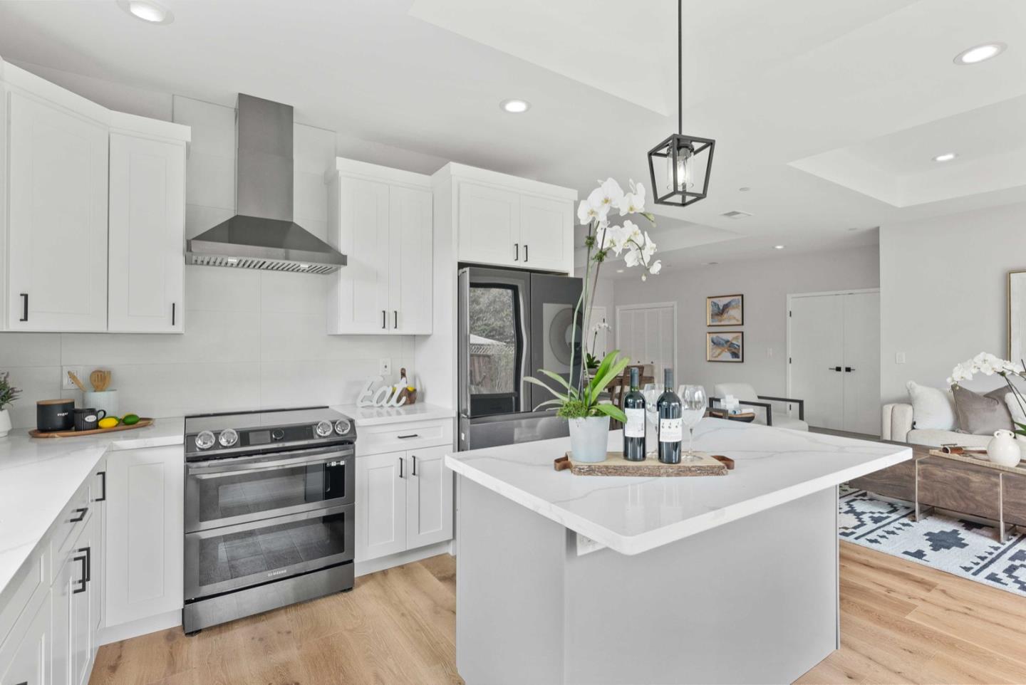 1766 Wagner Avenue Mountain View, CA 94043 - Photo 14 of 38 a kitchen with stainless steel appliances a sink stove and refrigerator