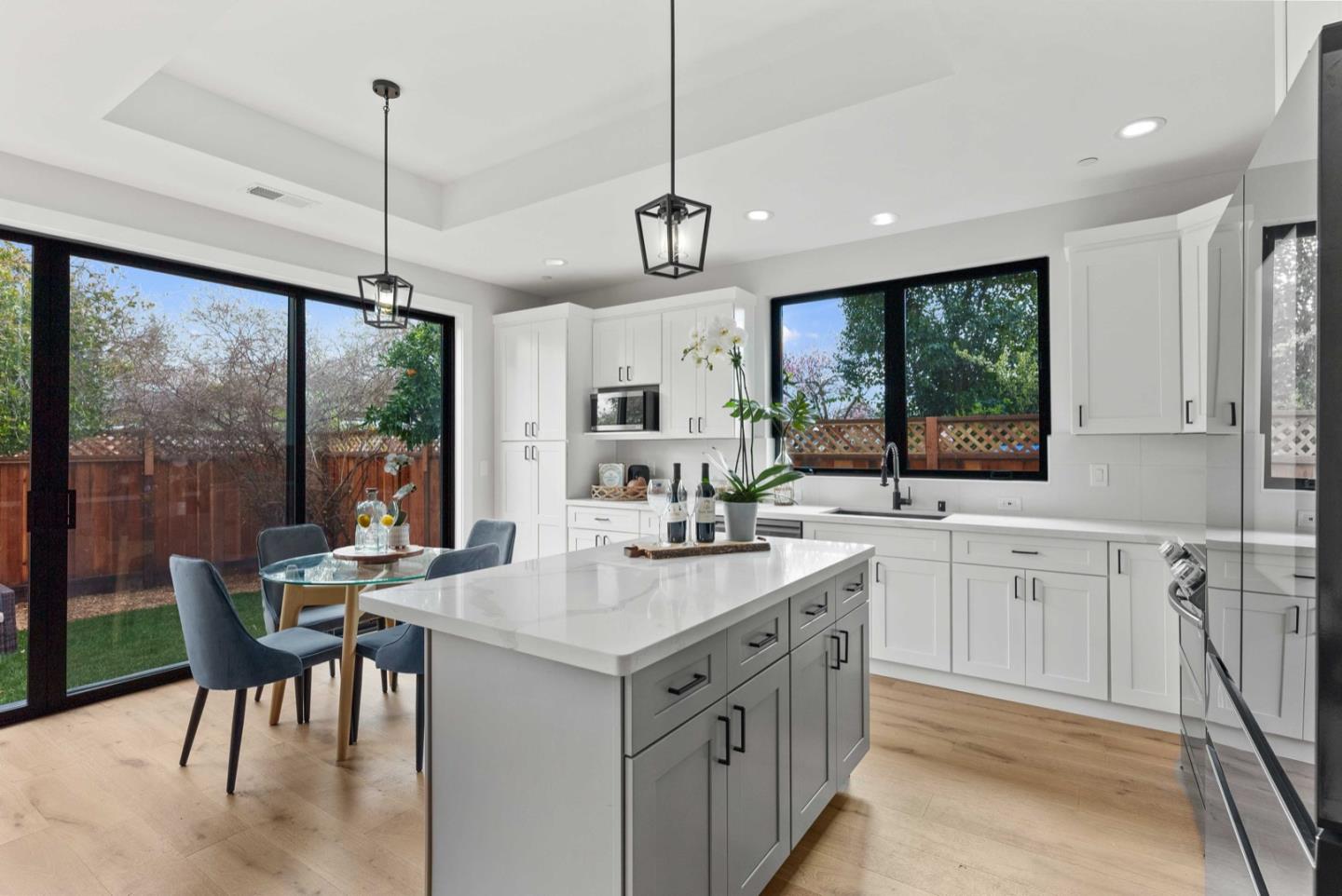 1766 Wagner Avenue Mountain View, CA 94043 - Photo 16 of 38 a large kitchen with kitchen island a large island in it