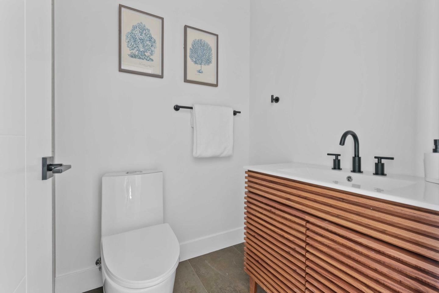 1766 Wagner Avenue Mountain View, CA 94043 - Photo 19 of 38 a bathroom with a sink a toilet and shower