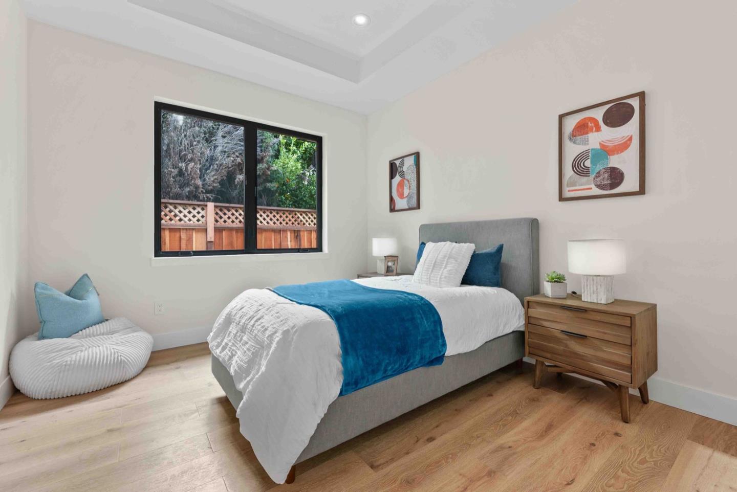 1766 Wagner Avenue Mountain View, CA 94043 - Photo 20 of 38 a bedroom with bed and a large window