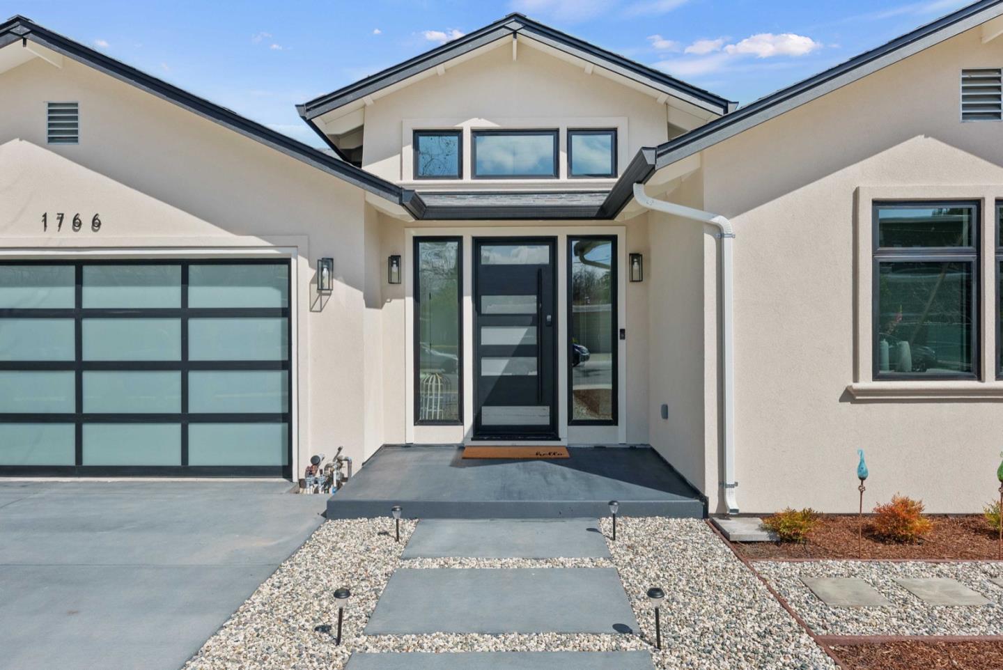 1766 Wagner Avenue Mountain View, CA 94043 - Photo 2 of 38 a front view of a house with a large window