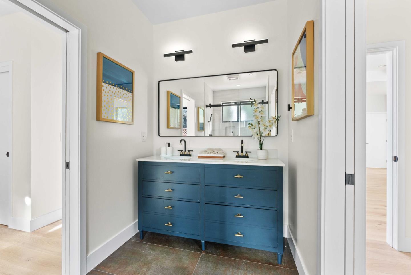 1766 Wagner Avenue Mountain View, CA 94043 - Photo 22 of 38 a bathroom with a sink mirror and vanity