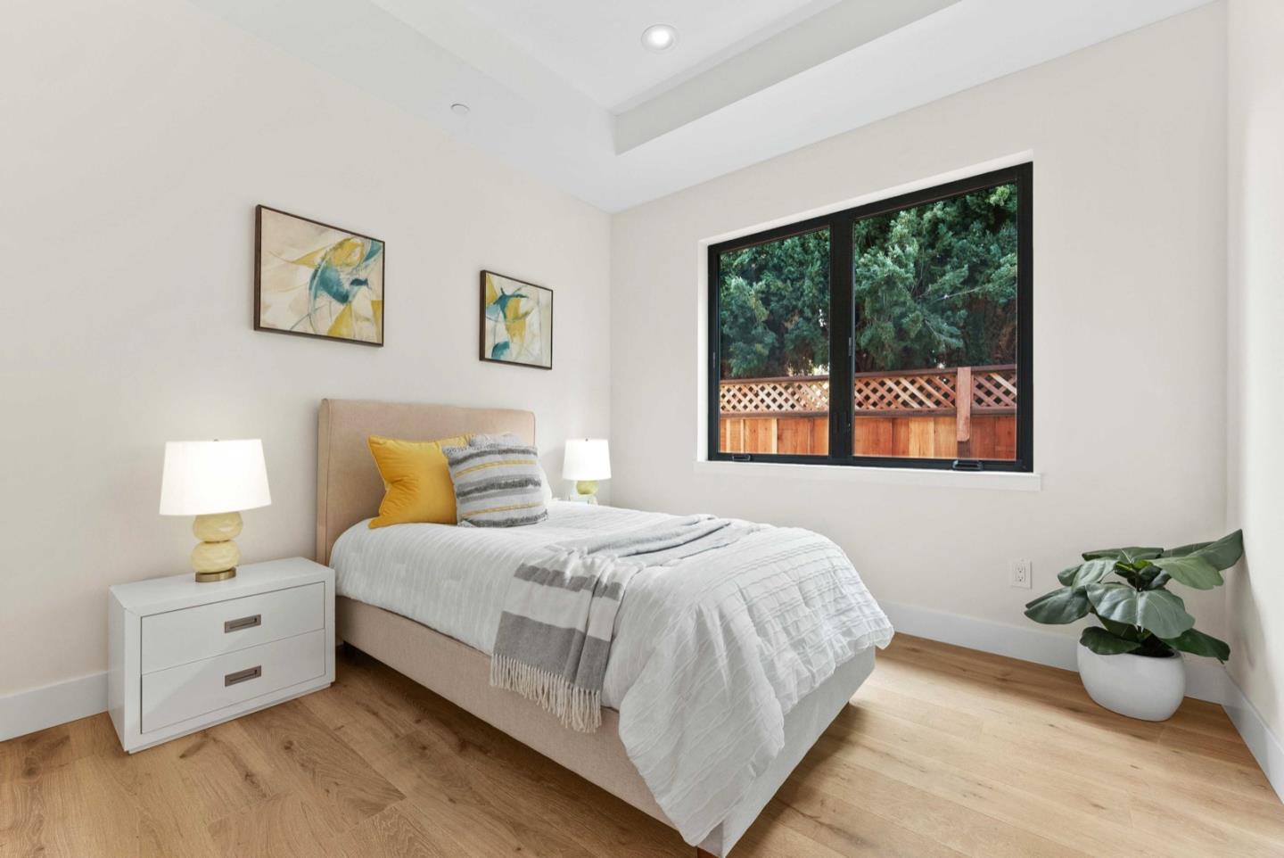1766 Wagner Avenue Mountain View, CA 94043 - Photo 23 of 38 a bedroom with a bed and a window