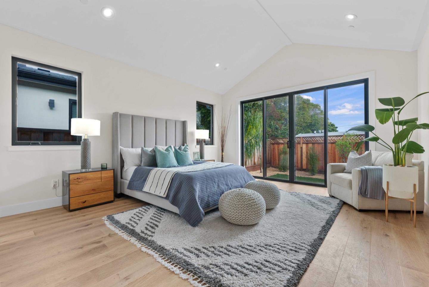 1766 Wagner Avenue Mountain View, CA 94043 - Photo 26 of 38 a spacious bedroom with a bed and glass window