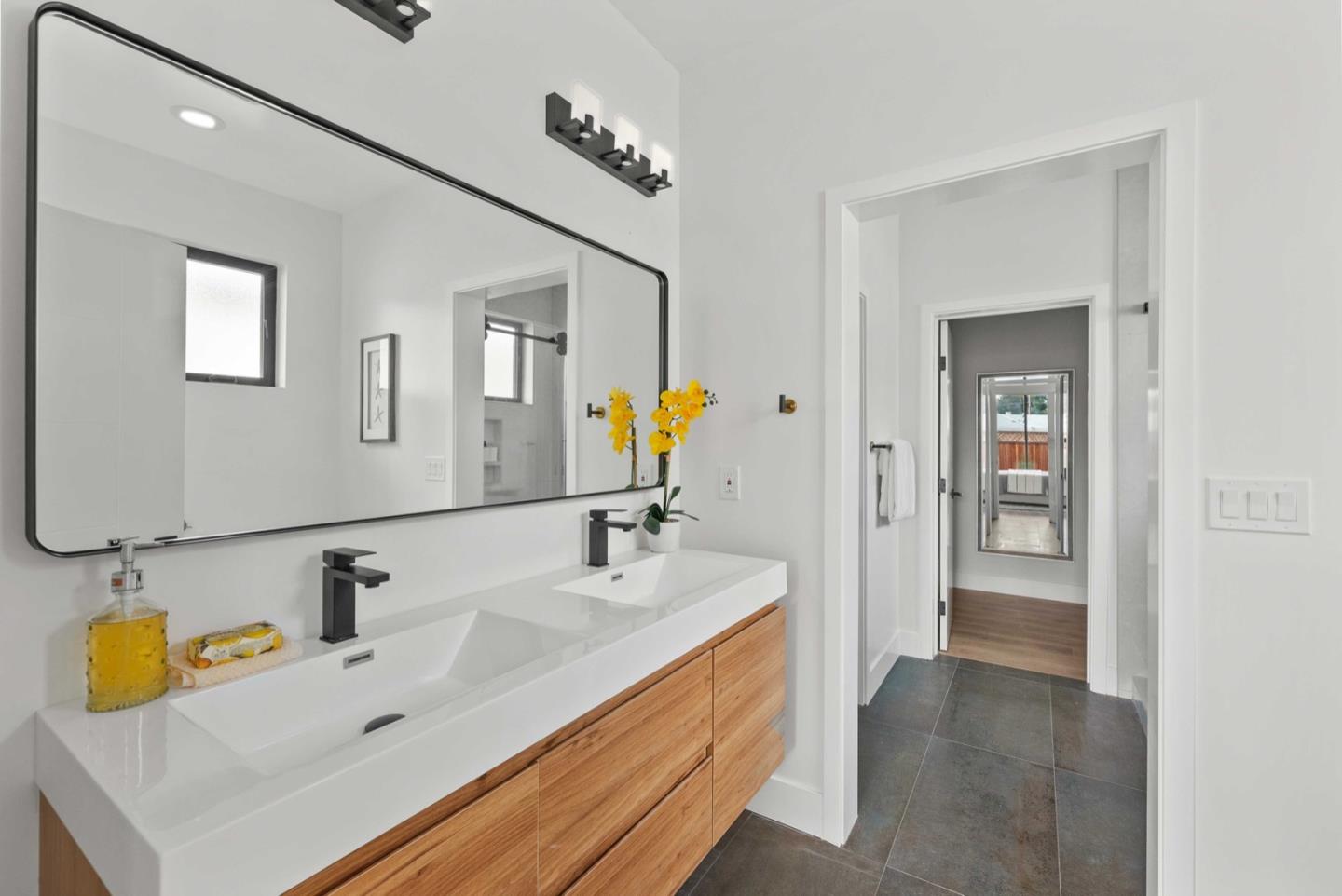 1766 Wagner Avenue Mountain View, CA 94043 - Photo 27 of 38 a bathroom with a sink and a mirror