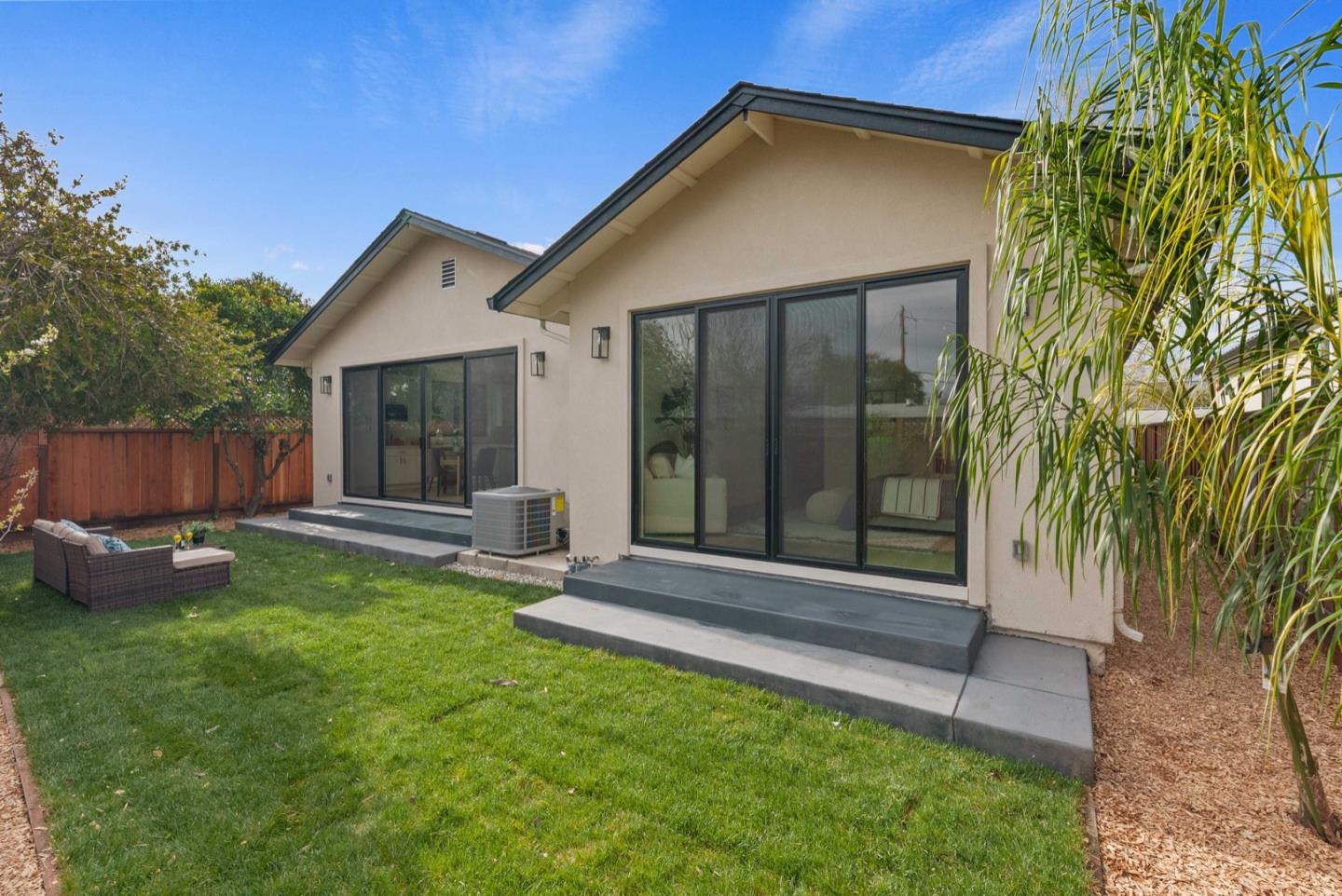 1766 Wagner Avenue Mountain View, CA 94043 - Photo 30 of 38 a view of a house with backyard and a garden