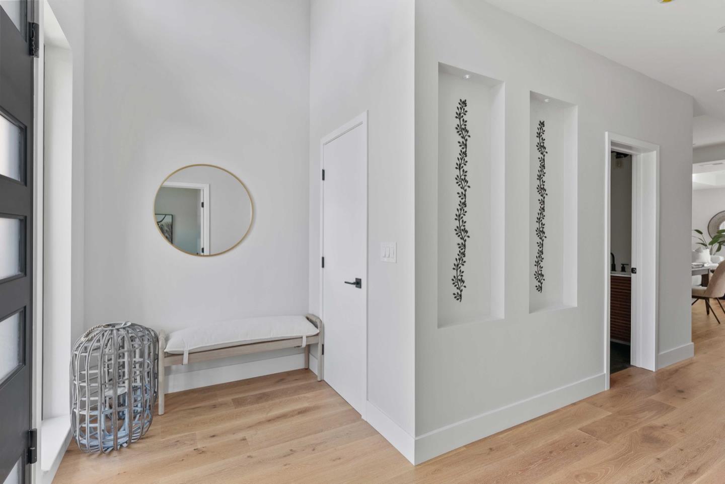 1766 Wagner Avenue Mountain View, CA 94043 - Photo 4 of 38 a view of a livingroom with wooden floor and a staircase