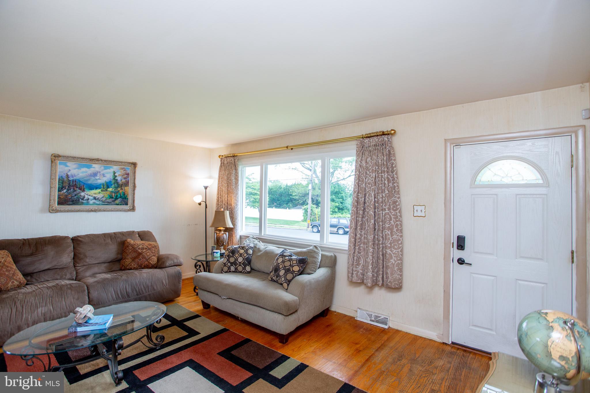 1264 Tulip Road Warminster, PA 18974 - Photo 4 of 21 a living room with furniture and a window