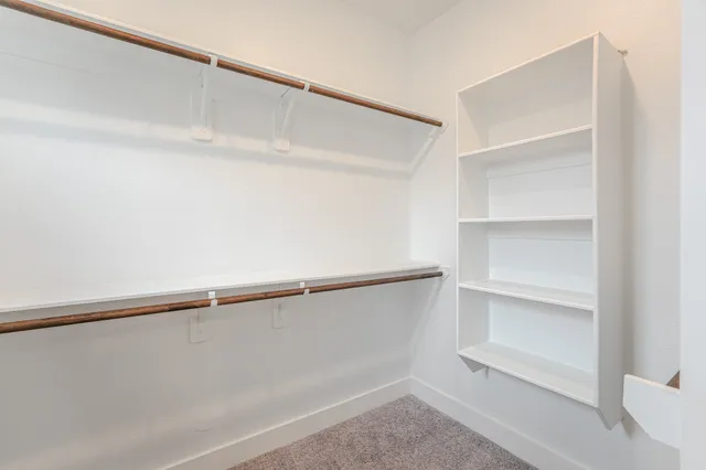 a view of a backyard with a small cabin