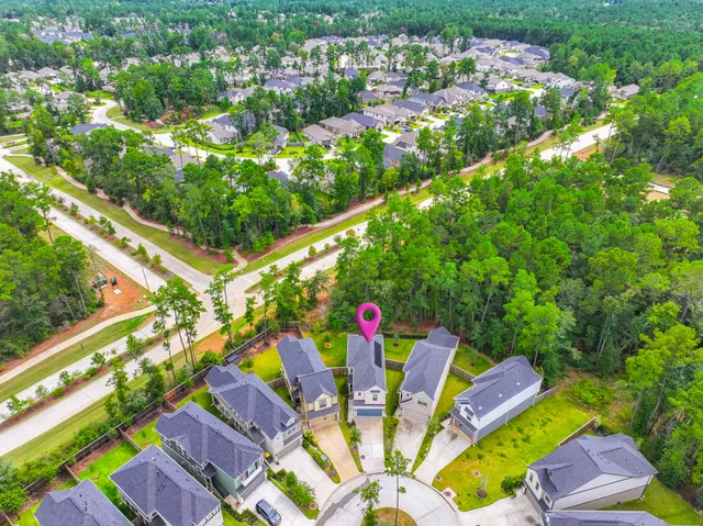a view of swimming pool with outdoor seating and city view