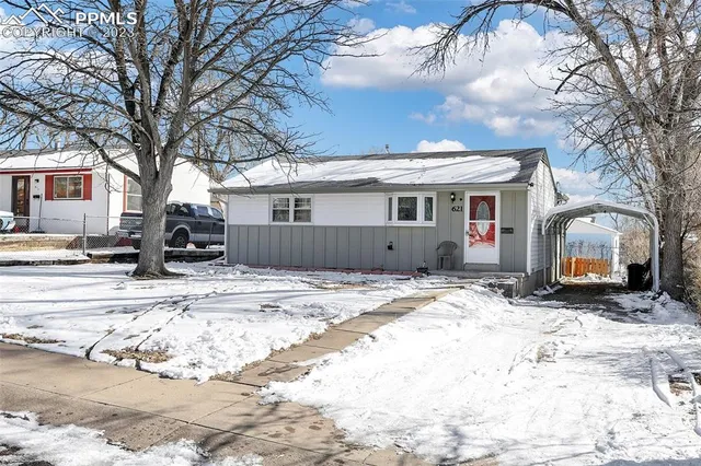 a view of a house with snow on snow
