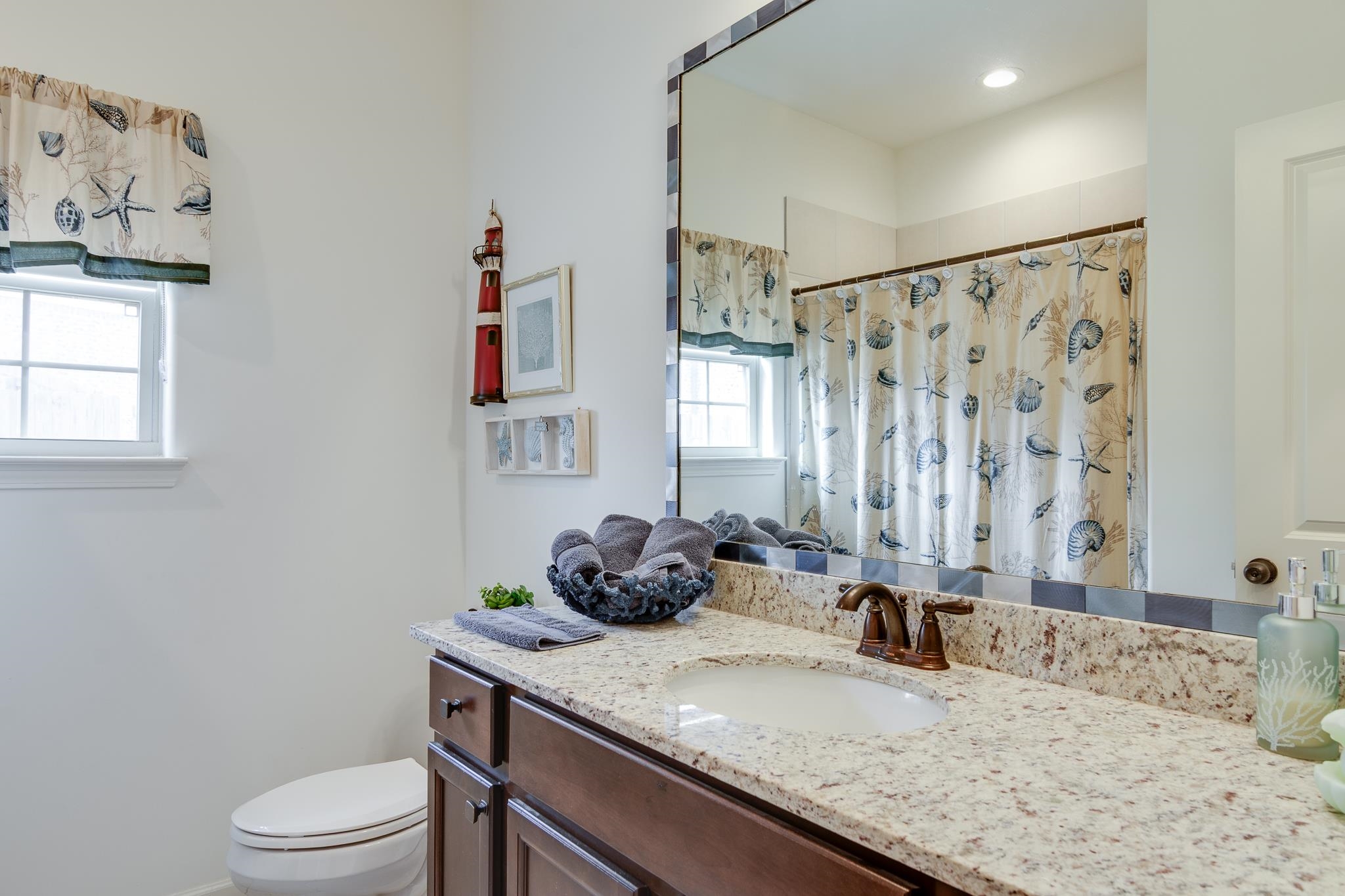 135 Chesnut Rdg Drive Oakland, TN 38060 - Photo 15 of 36 a bathroom with a granite countertop sink and a mirror