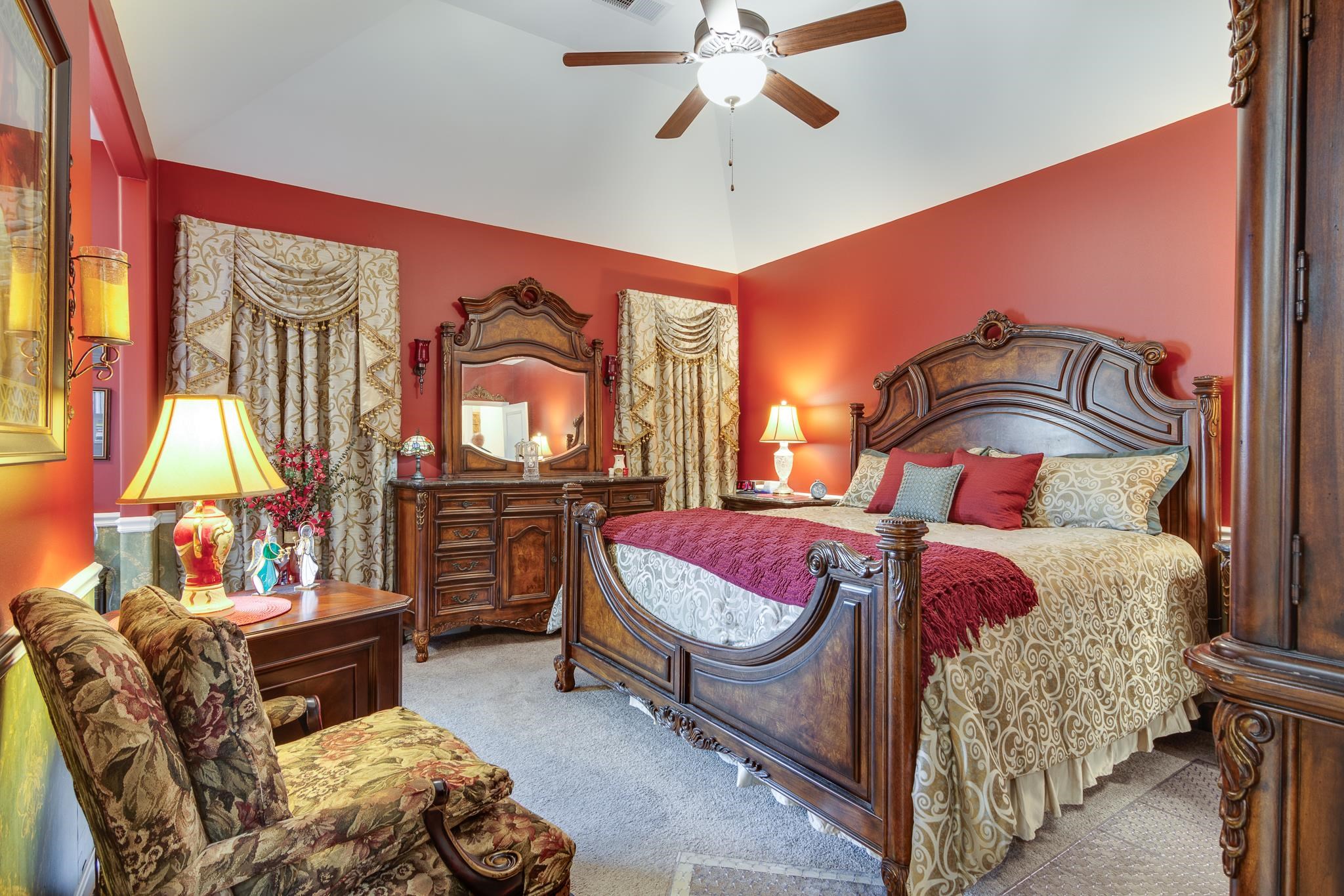 135 Chesnut Rdg Drive Oakland, TN 38060 - Photo 18 of 36 a bedroom with a bed and dresser with mirror