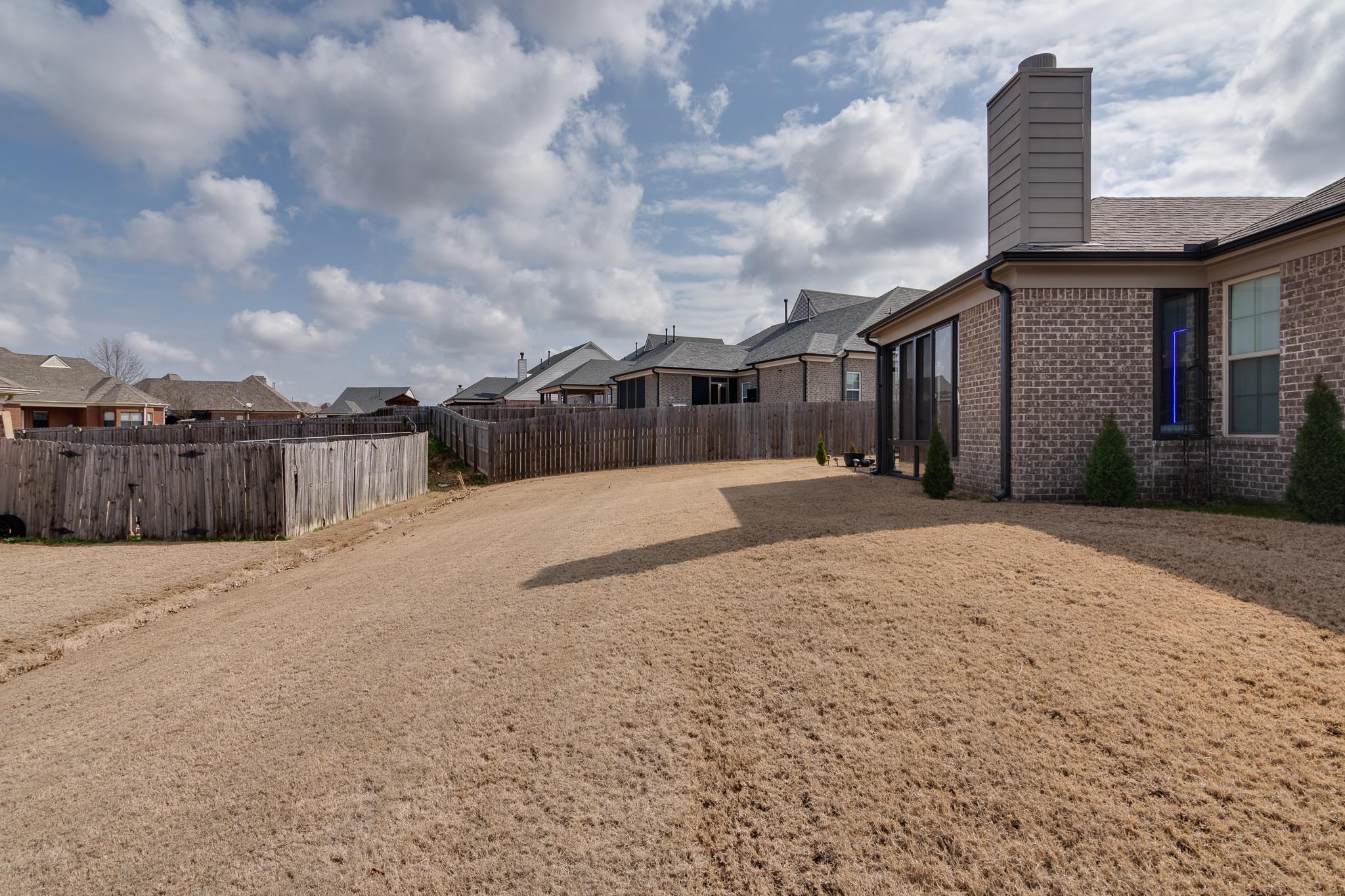 135 Chesnut Rdg Drive Oakland, TN 38060 - Photo 35 of 36 a view of large house with a yard