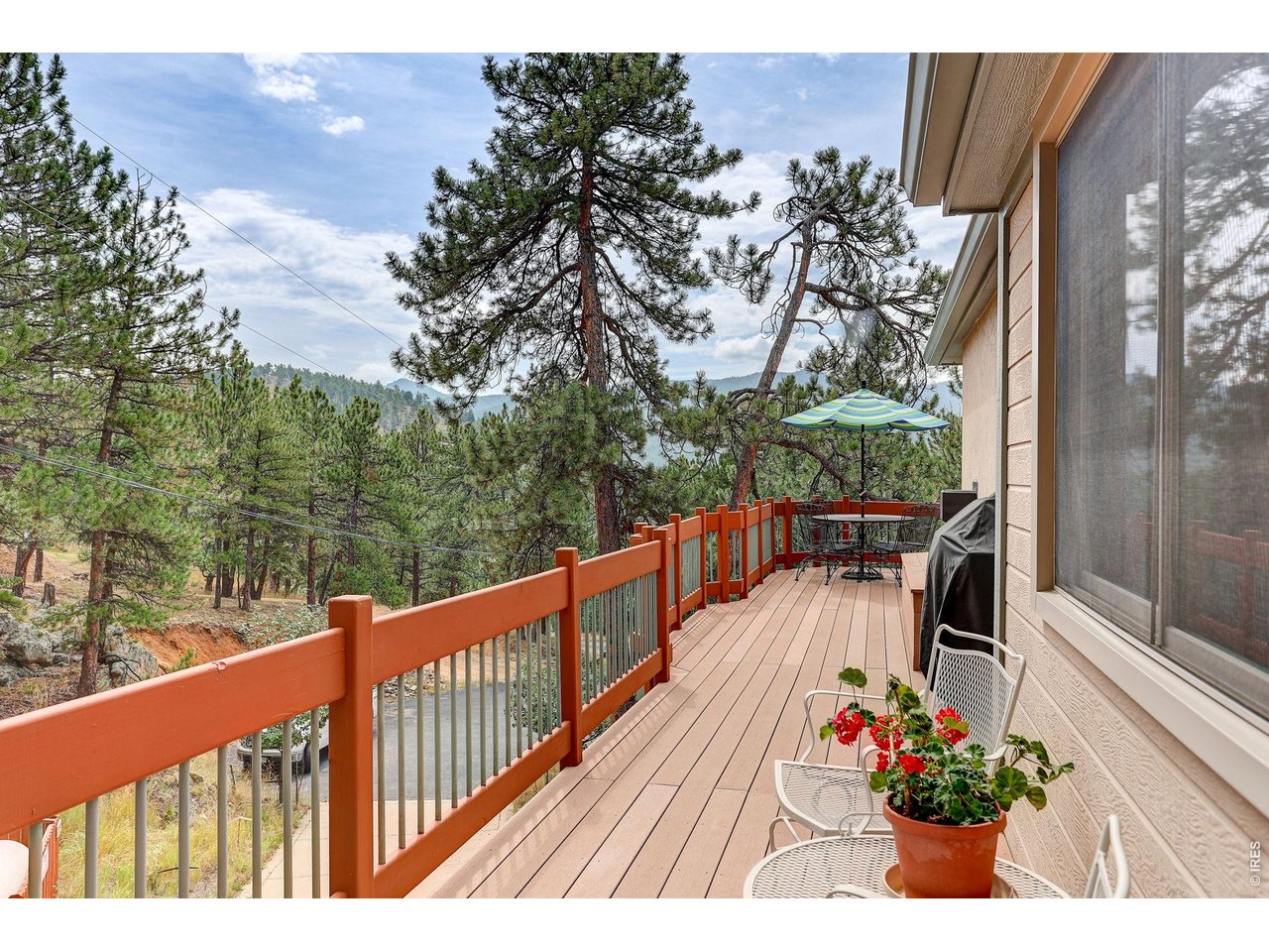 65 Betasso Road Boulder, CO 80302 - Photo 12 of 38 a view of a balcony with wooden floor and outdoor space