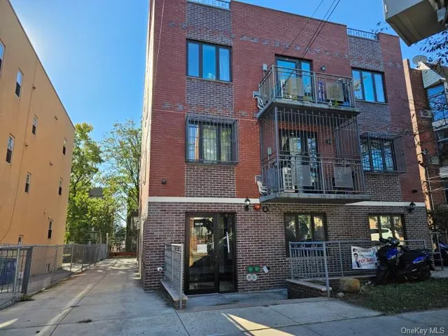 a front view of a building with street