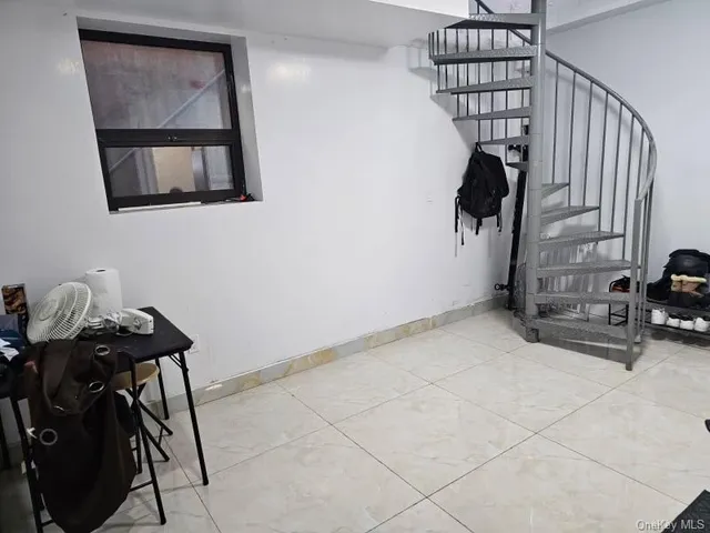 a view of entryway and workspace