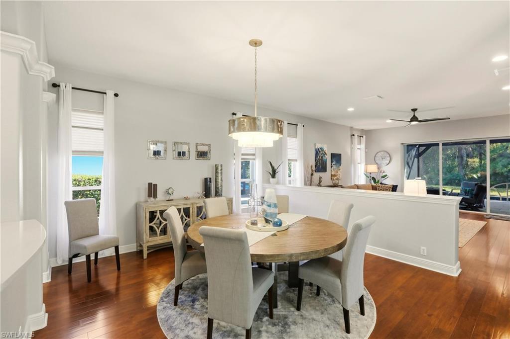 20441 Rookery Drive Estero, FL 33928 - Photo 11 of 41 a dining room with furniture window and wooden floor