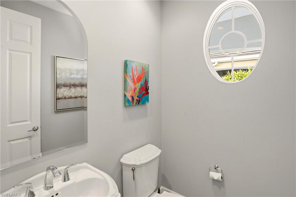 20441 Rookery Drive Estero, FL 33928 - Photo 27 of 41 a bathroom with a toilet and a sink