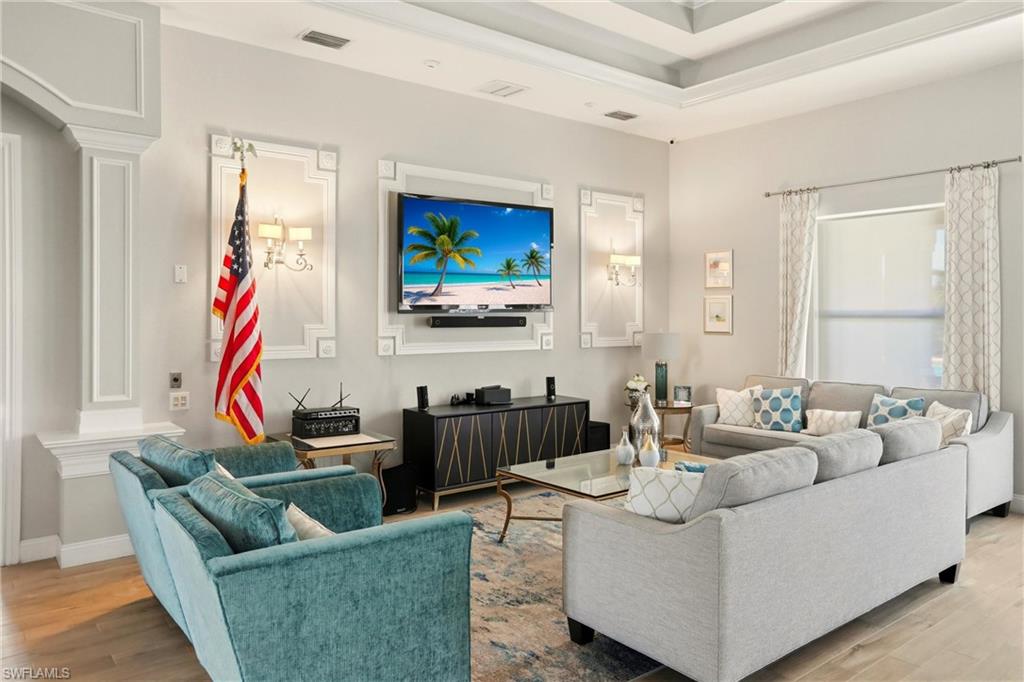 20441 Rookery Drive Estero, FL 33928 - Photo 35 of 41 a living room with furniture and a window