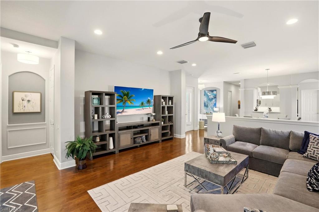 20441 Rookery Drive Estero, FL 33928 - Photo 10 of 41 a living room with furniture and a flat screen tv