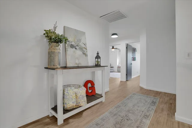 a bedroom with a large bed and a couch