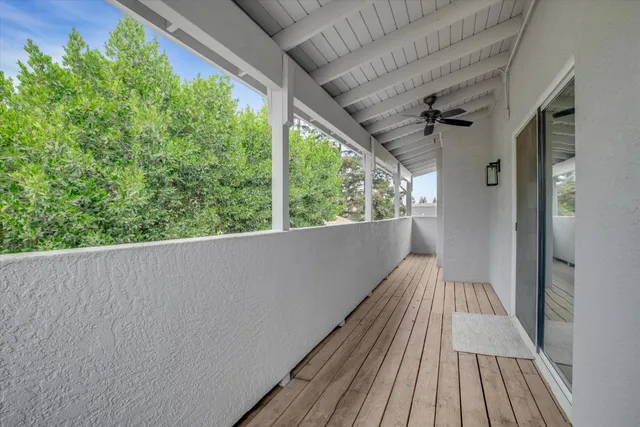 a backyard of a house with outdoor seating