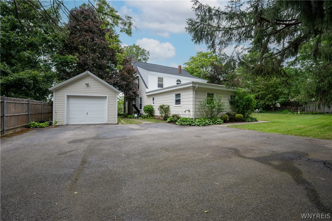 10775 Main Street Clarence, NY 14031 - Photo 12 of 50 Garage and parking araa