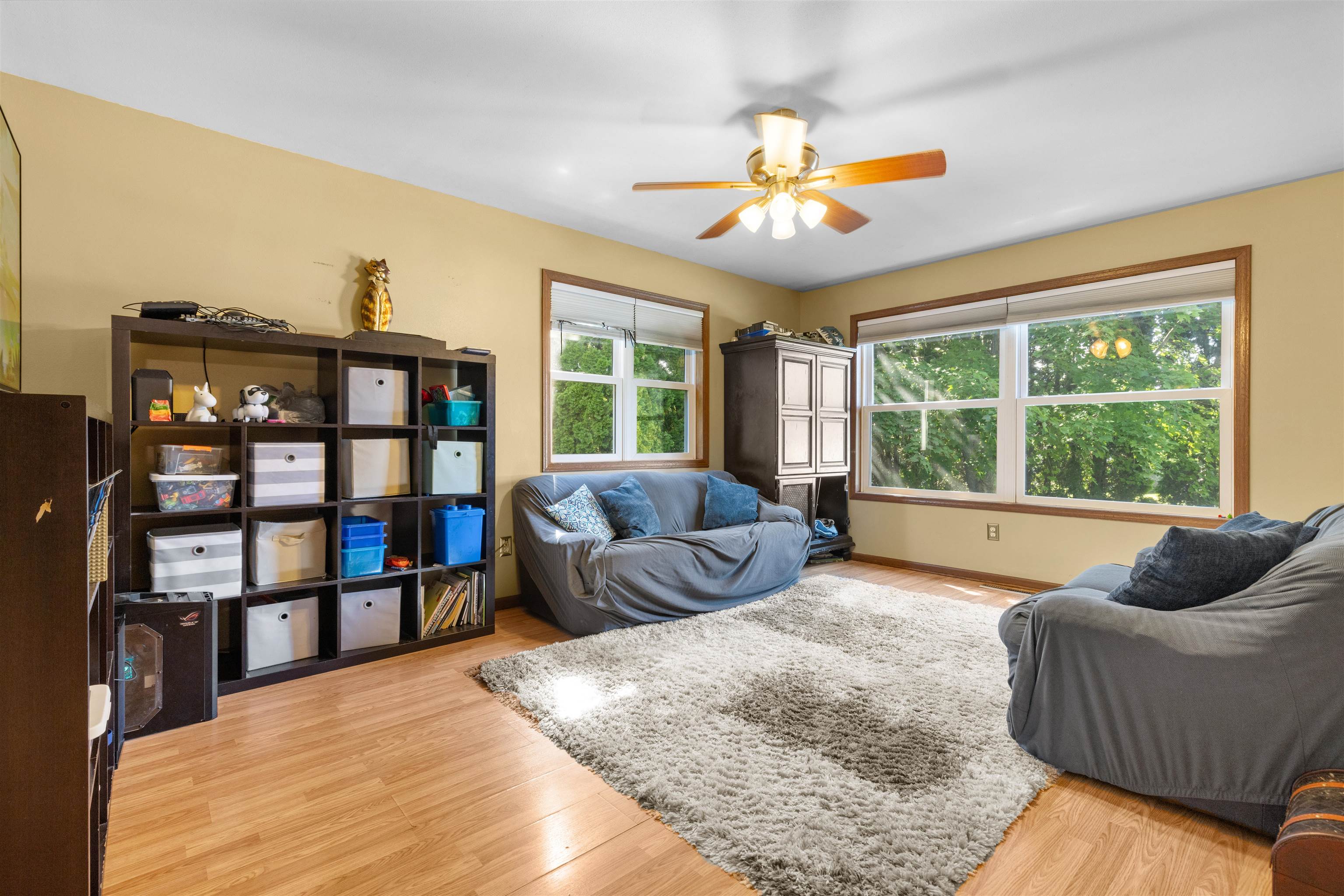 104 Deerpath Way Southwest Poplar Grove, IL 61065 - Photo 2 of 16 a living room with furniture and a large window