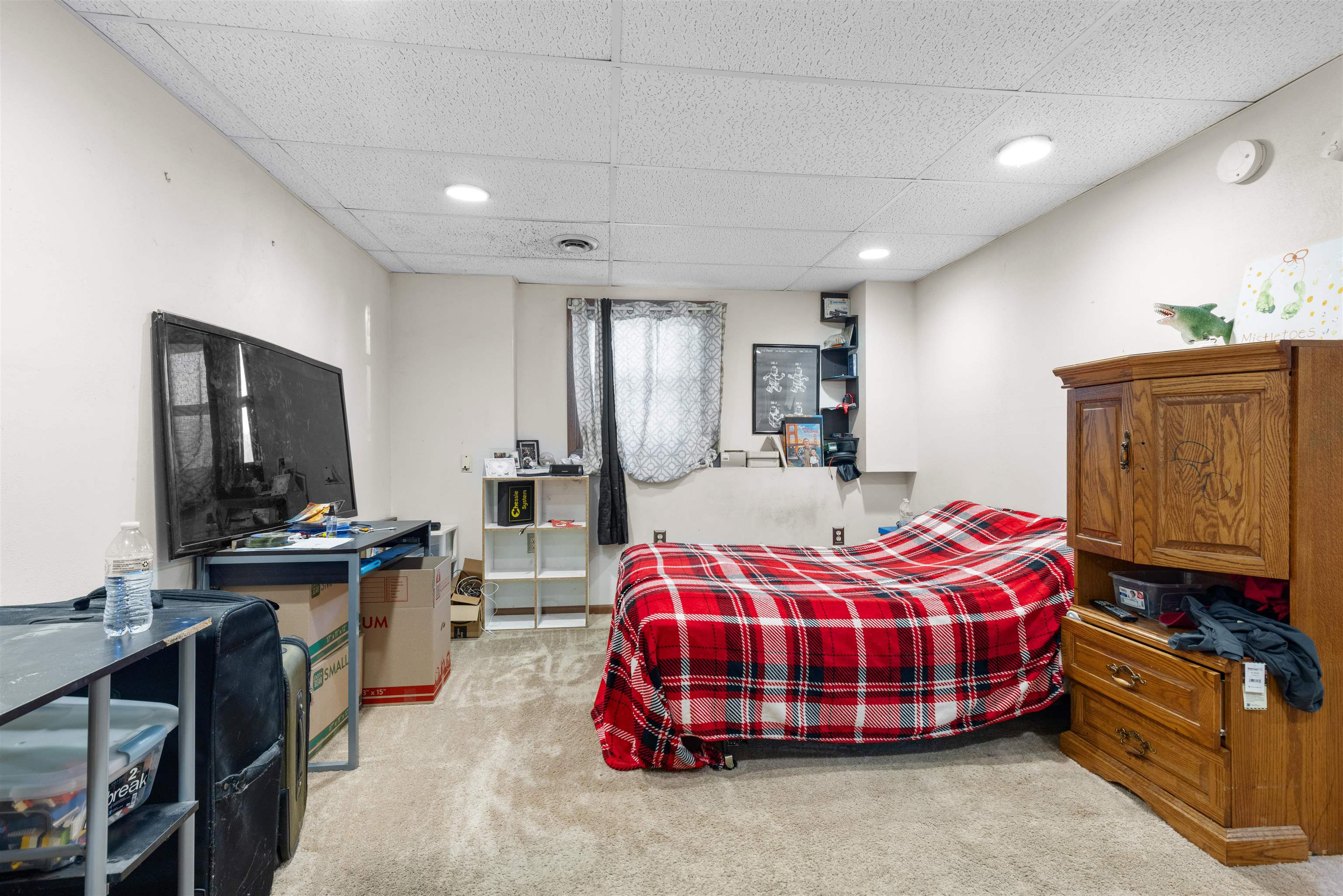 104 Deerpath Way Southwest Poplar Grove, IL 61065 - Photo 10 of 16 a bedroom with a bed and dresser