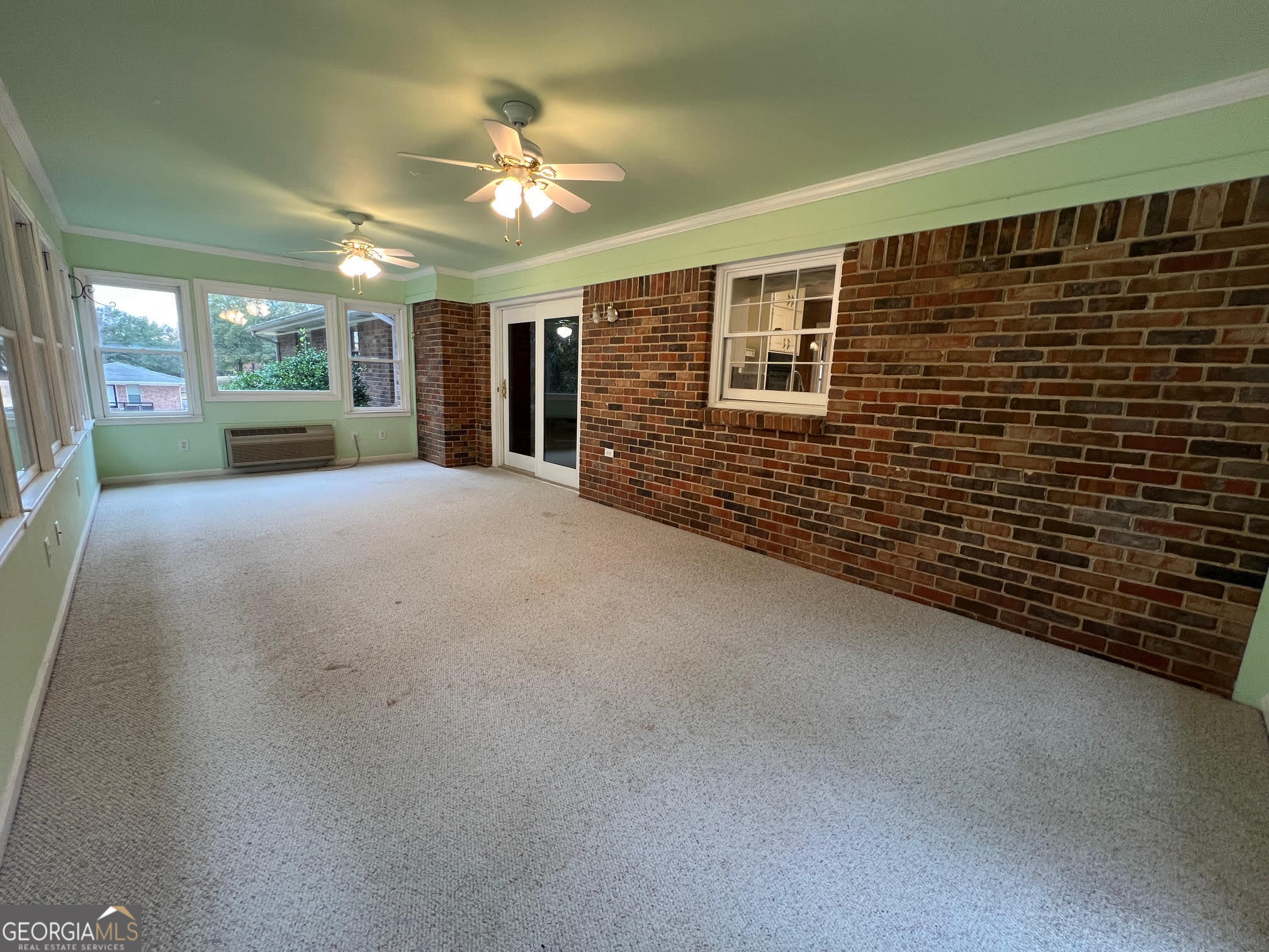 215 Old Oxford Road Covington, GA 30014 - Photo 18 of 19 a view of an empty room with a fireplace