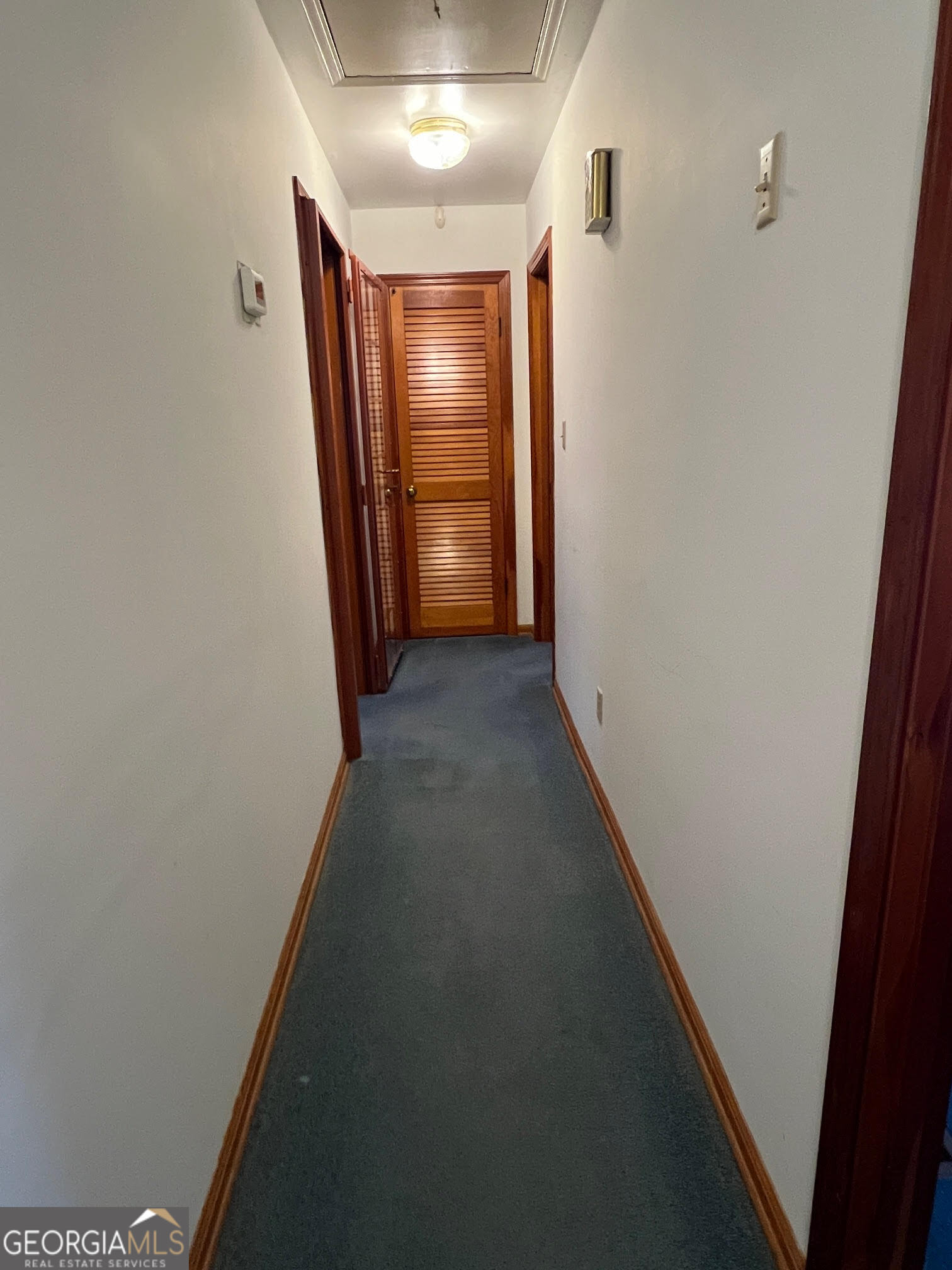 215 Old Oxford Road Covington, GA 30014 - Photo 8 of 19 a view of hallway with stairs