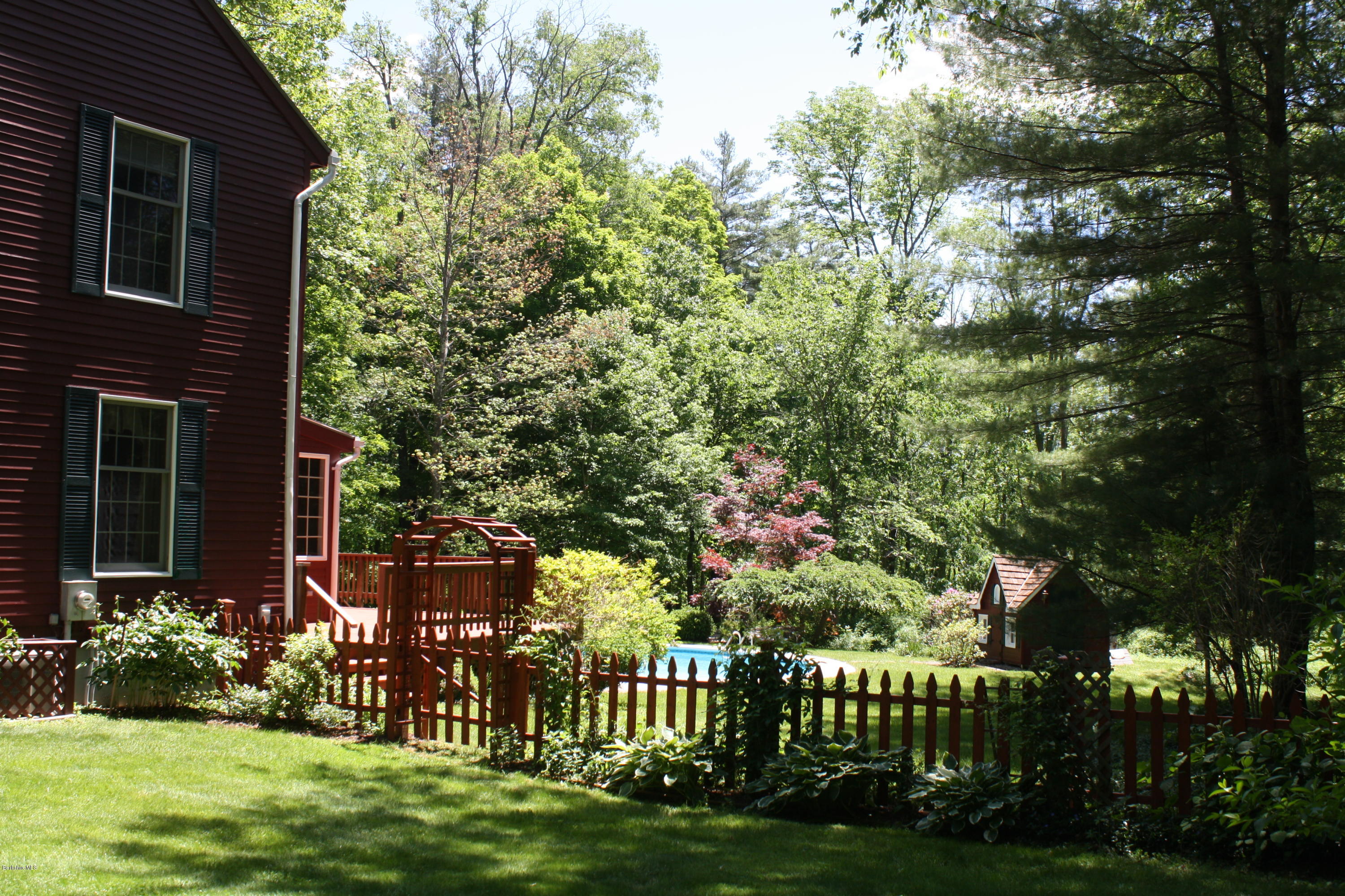 9 Quiet Knoll Road Stockbridge, MA 01266 - Photo 14 of 24 a view of a house with a garden