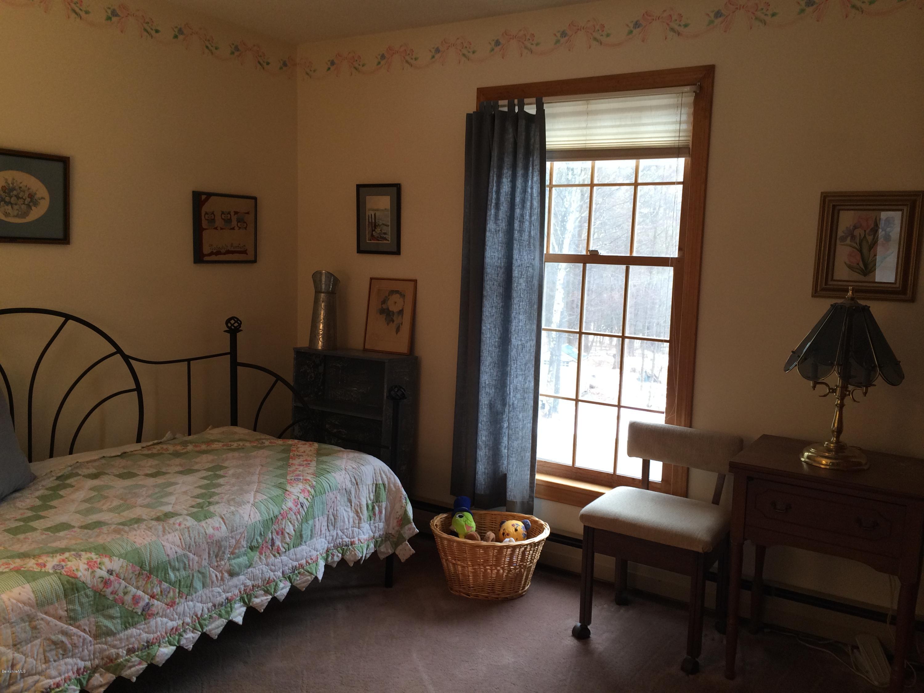 9 Quiet Knoll Road Stockbridge, MA 01266 - Photo 8 of 24 a bedroom with a bed and a couch