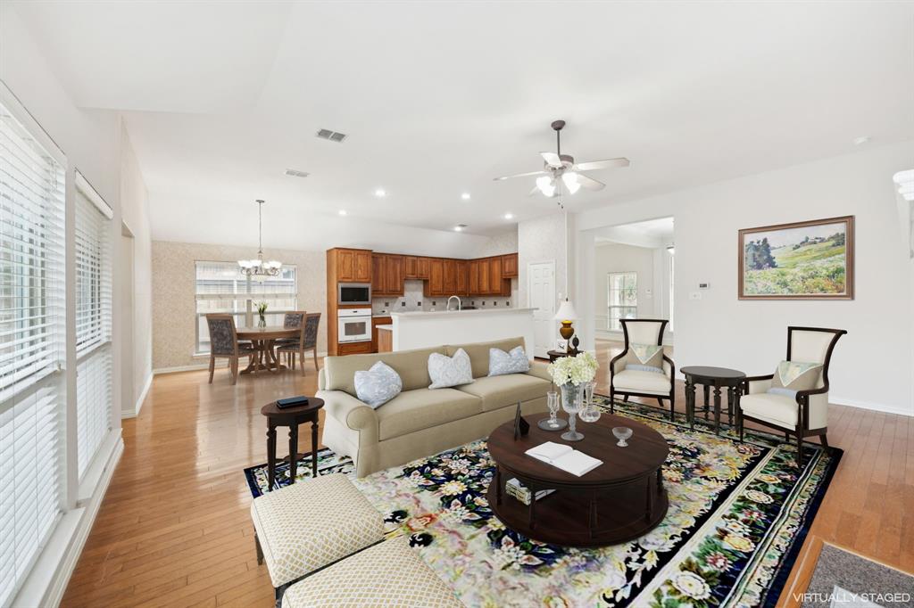 409 Fox Trail Allen, TX 75002 - Photo 10 of 31 a living room with furniture and wooden floor
