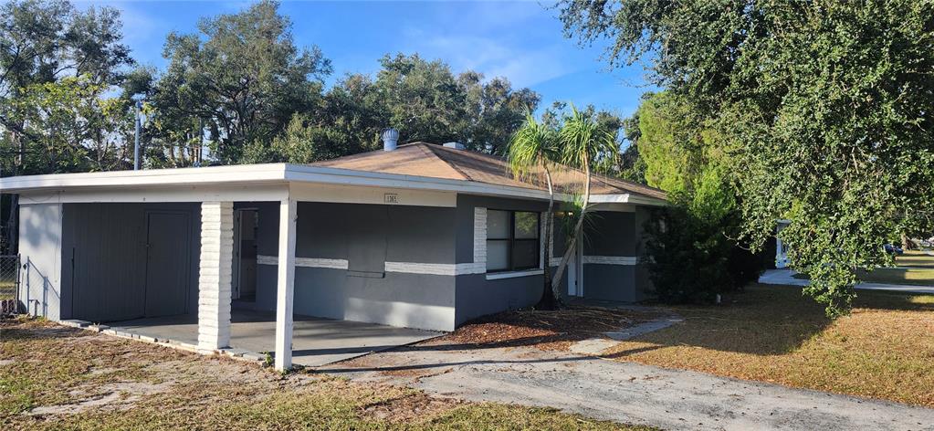 1365 Overlea Street Clearwater, FL 33755 - Photo 1 of 1 a front view of a house with a porch