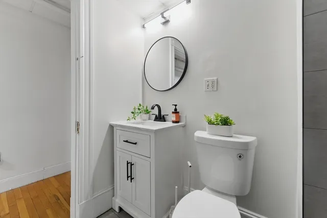 a bathroom with a sink and a shower