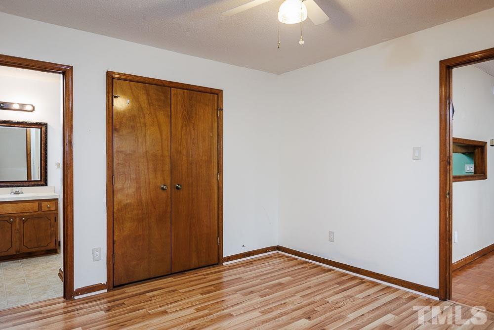 3249 Mill Run, Unit 190 Raleigh, NC 27612 - Photo 14 of 23 Spacious closet and direct access to the bathroom.