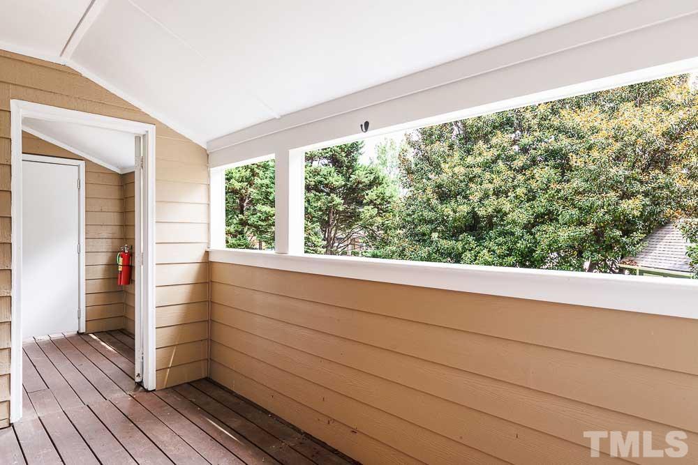 3249 Mill Run, Unit 190 Raleigh, NC 27612 - Photo 4 of 23 Covered patio with secure door. An easy, private place to relax in!