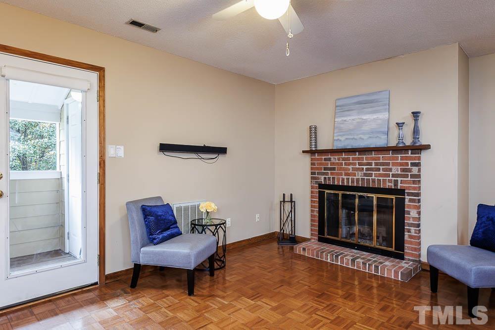 3249 Mill Run, Unit 190 Raleigh, NC 27612 - Photo 7 of 23 Wood burning fireplace!