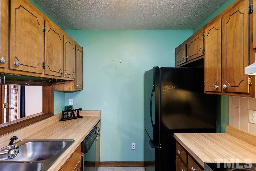 3249 Mill Run, Unit 190 Raleigh, NC 27612 - Photo 10 of 23 Refrigerator conveys!