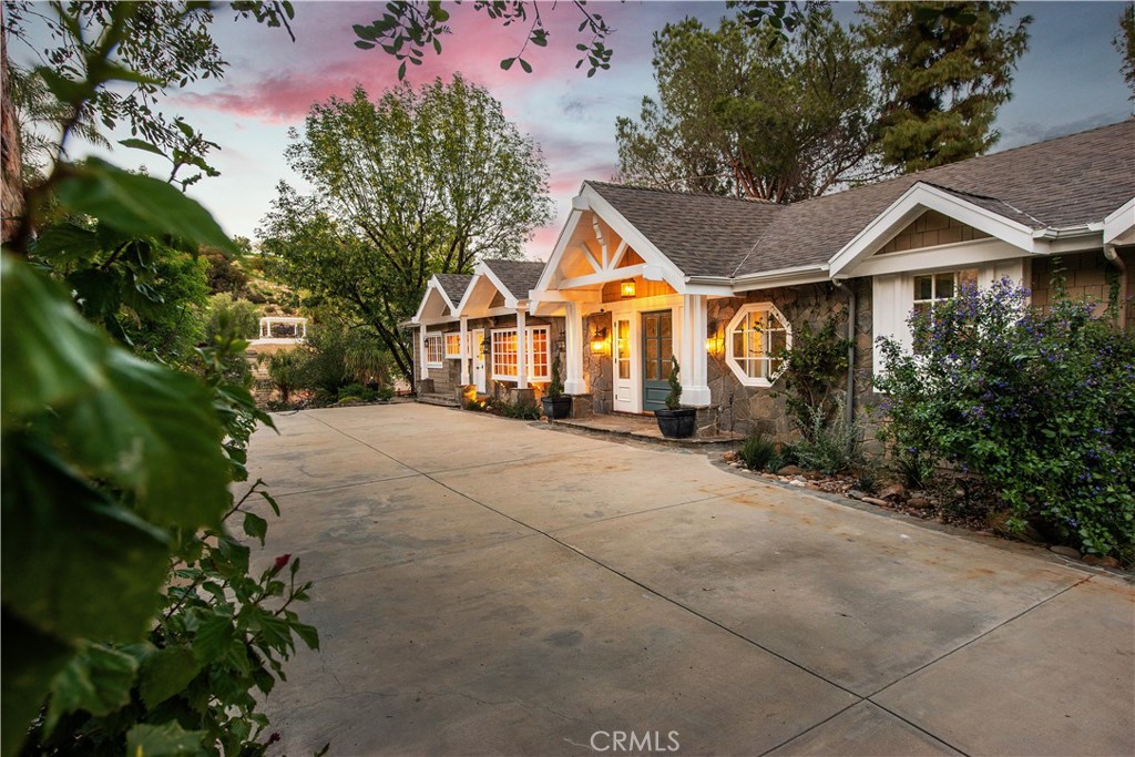 22757 Plummer Street Chatsworth, CA 91311 - Photo 3 of 42 a house with a yard