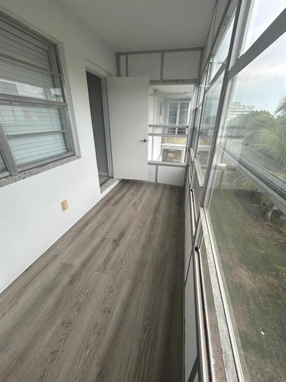 1310 Northwest 43rd Avenue, Unit 303 Lauderhill, FL 33313 - Photo 14 of 15 a view of a house with wooden floor