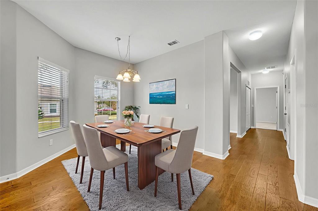 3201 Sonesta Court, Unit A Clermont, FL 34711 - Photo 13 of 34 a view of a dining room with furniture and window