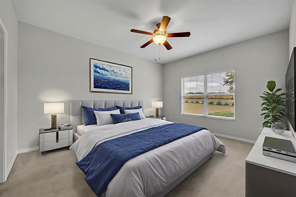 3201 Sonesta Court, Unit A Clermont, FL 34711 - Photo 21 of 34 a bedroom with a bed and a window